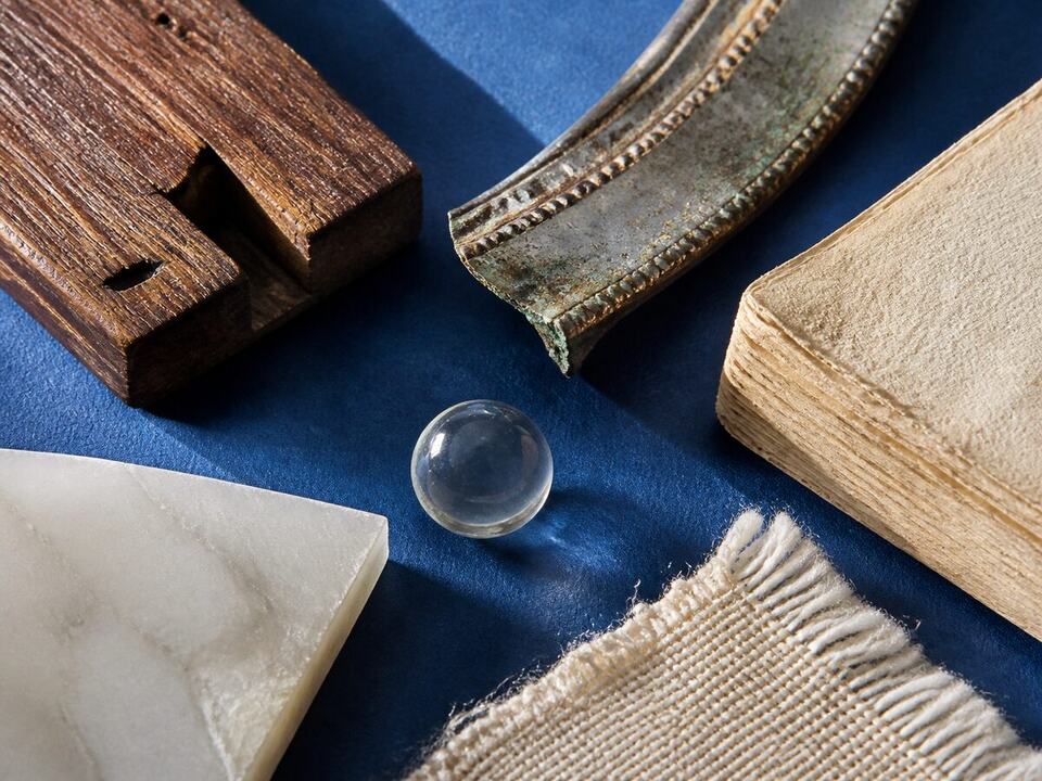 Reading a wooden surf plug from the maker’s bench: a devotional object arranged on a worktable